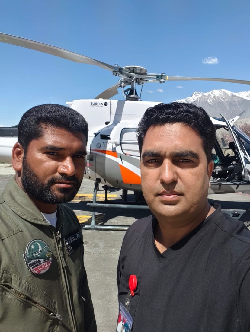 Team photo with helicopter ambulance